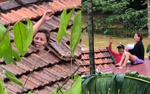 Quảng Bình: Mắc kẹt trong nhà với con nhỏ 1 tháng tuổi, người phụ nữ dỡ ngói kêu cứu giữa biển nước mênh mông