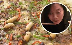 Đang 'chén' ngon lành món đuông dừa, cô gái bất ngờ bị món ăn quay ra cắn vào môi