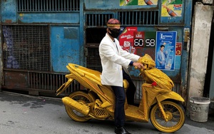 7 ngày qua ảnh: Người đàn ông đi mô tô dát vàng trên phố ở Thái Lan