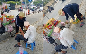 Thấy vết máu trên vai áo cụ ông, cô bán hàng rong có hành động khiến tất cả ấm lòng