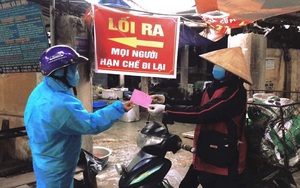 Ảnh: Người dân Chí Linh (Hải Dương) bắt đầu đi chợ bằng tem phiếu theo ngày chẵn - lẻ