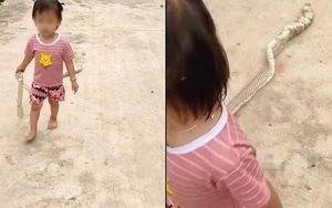 Em bé đi trên đường làng, nhìn kĩ đồ cầm ở tay, tất cả đều kinh hãi
