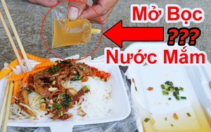 Làm thế nào mở bịch nước mắm trong hộp cơm mà không bị dính hay văng vào người?