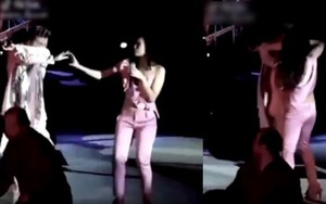 Hình ảnh Đàm Vĩnh Hưng bị tấn công bằng bình xịt hơi cay, Mỹ Tâm lao lên bảo vệ bất ngờ gây sốt