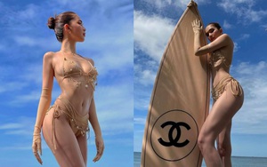 Ngọc Trinh tung clip hậu trường chụp bikini nóng bỏng bên ván lướt sóng đắt đỏ