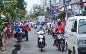 TP.HCM: Dân thong dong tập thể dục, đi chợ, quán ăn nhộn nhịp sau thông tin quận 7 thí điểm mở cửa trở lại