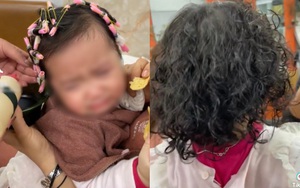 Bé gái 1,5 tuổi khóc ngằn ngặt khi đi làm tóc xoăn đón Tết, dân mạng bức xúc
