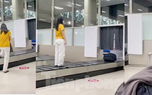 Cục Hàng không sẽ xử lý nghiêm nữ khách đứng lên băng chuyển hành lý sân bay