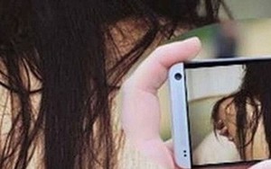 Xông vào nhà nghỉ quay clip người tình quan hệ với người đàn ông khác rồi tống tiền