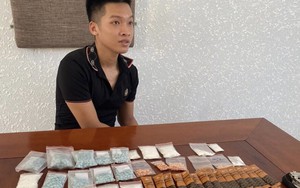 Đà Nẵng: Bắt thanh niên tàng trữ gần 2 kg ma túy, súng ngắn, còng số 8