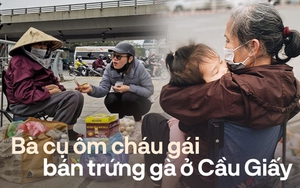 Nước mắt phía sau bức ảnh bà cụ bán trứng ôm bé gái ở ngã tư Cầu Giấy