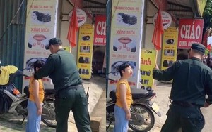Câu chuyện xúc động đằng sau hình ảnh bé gái được sĩ quan CSCĐ tặng còi chỉ huy