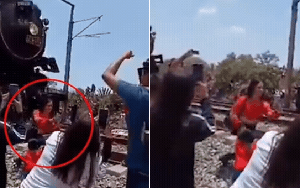 Video kinh hoàng: Cố chụp ảnh tự sướng, người phụ nữ bị tàu hỏa đâm