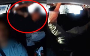 Mưa lớn khiến giao thông tê liệt, du khách la hét, ném điện thoại rồi có hành động phản cảm trên taxi