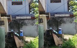 Bé gái 5 tuổi mặc áo tốt nghiệp đứng trước song sắt nhà tù vẫy tay và câu chuyện ám ảnh phía sau