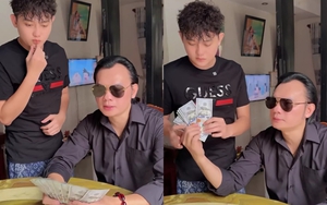 Nam NSƯT từ Mỹ về, cầm một sấp tiền USD cho cháu dâu