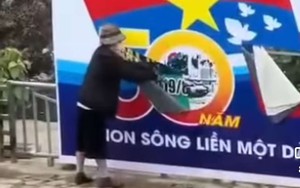 Danh tính người phụ nữ Hà Nội rạch banner chào mừng đại lễ 30/4