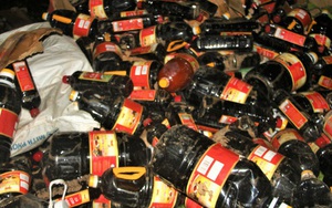 Cả ngàn chai nước mắm bị vứt bỏ trong bụi rậm ở Quảng Nam