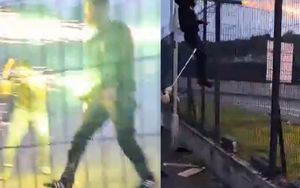 Kinh hoàng cảnh CĐV đánh nhau bằng gậy sắt, bắn pháo hỗn loạn ngoài sân vận động khiến 2 người nhập viện