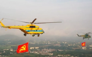 10 trực thăng thao luyện kéo cờ Đảng, cờ Tổ quốc trên bầu trời Hà Nội