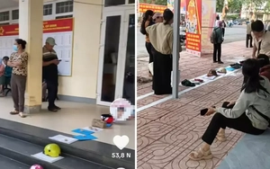 Người dân dùng mũ bảo hiểm, gạch đá 'đặt chỗ' nộp hồ sơ: Chủ tịch xã nói gì?