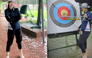 Hotgirl bắn cung Đỗ Thị Ánh Nguyệt lội nước tập luyện trong ngày Hà Nội mưa lớn