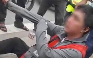 Vụ nam shipper bị đánh vì không cho khách kiểm tra hàng: Có được kiểm tra?