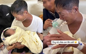 Xúc động cảnh ông nội đeo ống thở, cố bế cháu lần cuối trước khi qua đời: Con dâu chia sẻ chuyện phía sau