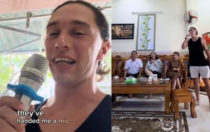 Xem anh Tây đi lấy đồ giặt 'bị' chủ tiệm kéo vào hát karaoke, dân mạng bật cười