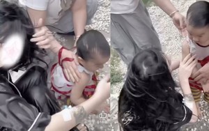 Cô gái nhảy xuống nước cứu em bé dù vẫn đang đeo ống truyền dịch trên tay