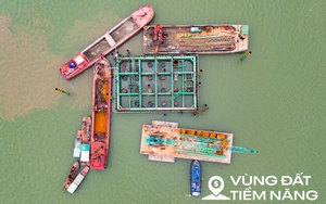 Toàn cảnh công trường xây cầu hơn 16.000 tỷ của Sun Group ở Hà Nội: Máy móc phủ kín mặt sông, phấn đấu hoàn thành nhanh nhất Việt Nam