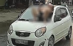 Nam thanh niên nằm trên nắp capo ô tô đang chạy ở Hà Nội: Khởi tố bố và con rể