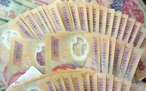 Cảnh báo xuất hiện tiền giả loại mới mệnh giá 100.000 đồng và 200.000 đồng
