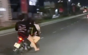 3 thiếu nữ đi xe máy lạng lách, đánh võng trên đường
