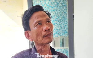 Cha già nín thở nhìn thợ lặn tìm con ở vùng biển Mũi Nghê
