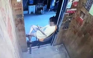 Người phụ nữ mang ghế ra chặn cửa thang máy, ngồi chơi cả buổi để hưởng điều hòa miễn phí