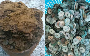 Đào móng xây nhà phát hiện chum sành chứa cả yến tiền xu