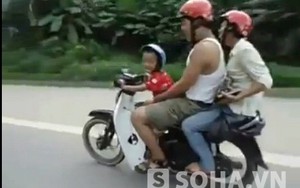 Sốc với video bé 5 tuổi lái xe máy vù vù trên quốc lộ