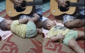 Ông bố trẻ đệm đàn Guitar hát ru con cực cảm động