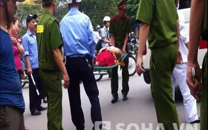 Một phụ nữ bị quây đánh dã man đến ngất xỉu giữa phố Hà Nội