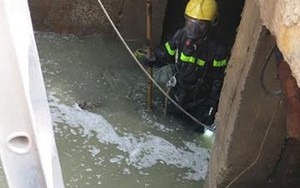 Bé trai bị cuốn xuống cống là do xe buýt chạy tạo sóng?