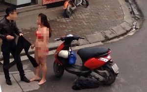 Hà Nội: Cãi nhau với bạn trai, cô gái cởi phăng đồ giữa phố
