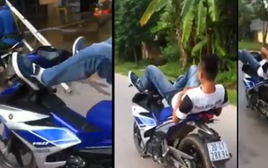 Công an triệu tập thanh niên nằm ngửa lái xe máy bằng hai chân