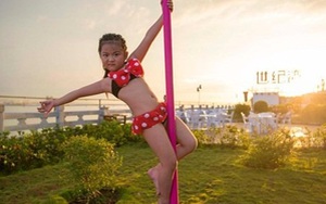 Hình ảnh bé gái mặc bikini múa cột khiến dư luận "dậy sóng"
