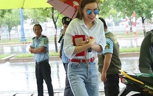 Hồ Ngọc Hà đội mưa đi sự kiện