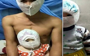 Cười nghiêng ngả với cách tránh rét của bố con 'siêu nhân bỉm sữa'