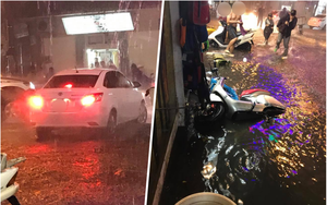 Trong tối Hà Nội mưa lớn, hành động của xe ô tô khiến bao người khốn đốn