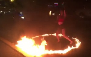 Người quay clip "cô gái ăn mặc sexy đổ xăng ra đường múa lửa" nói gì?