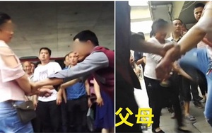 Bất chấp mọi lời can ngăn, cô gái 19 tuổi liên tục đánh chửi bố mẹ già thậm tệ giữa đường