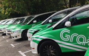 Bộ Giao thông vận tải đốc thúc dán logo cho Uber, Grab